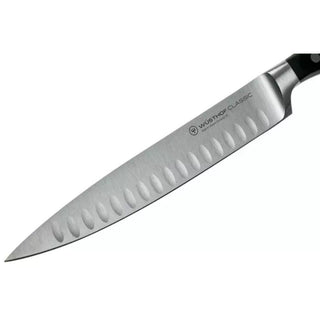 Wusthof Classic carving knife with hollow edge 23 cm. black - Buy now on ShopDecor - Discover the best products by WÜSTHOF design